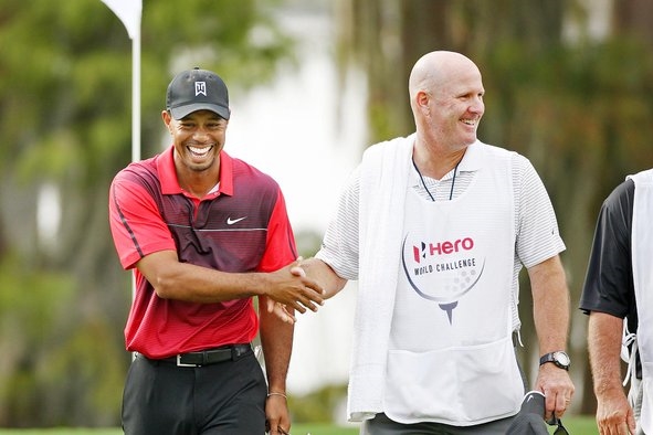 Tiger Woods y Joe LaCava. Foto @tdogden
