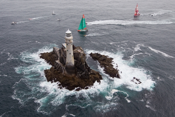 Groupama Sailing Team, skippered by Franck Cammas from France and CAMPER with Emirates Team New Zealand, skippered by Chris Nicholson from Australia, rounding Fastnet Rock, on leg 9 of the Volvo Ocean Race 2011-12, from Lorient, France to Galway, Ireland.