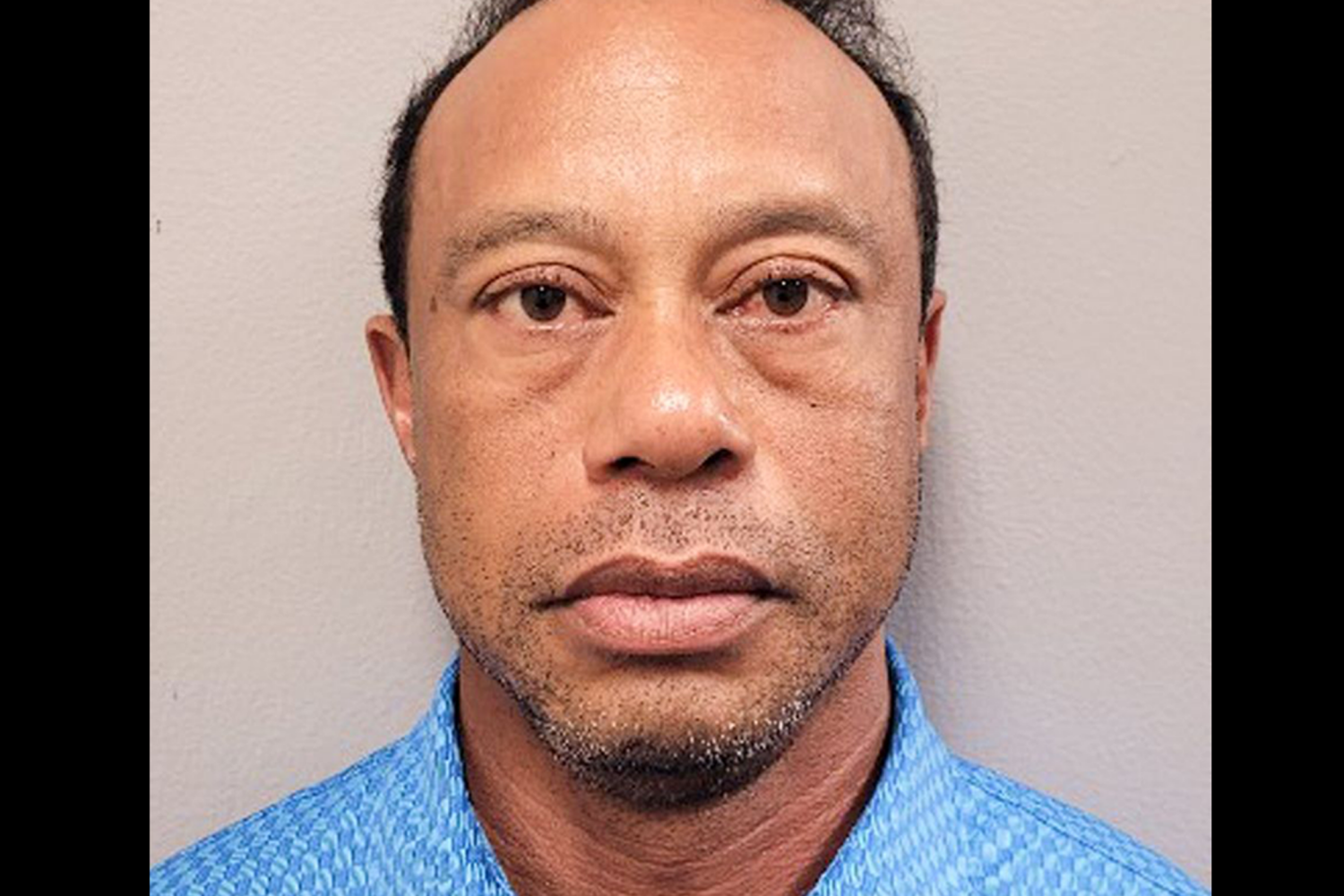 Accidente Tiger Woods, Tiger Woods, John Budensiek,