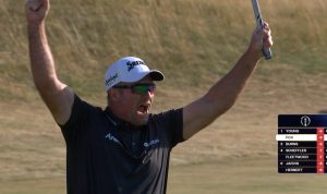 Golfer in dark shirt cheers with arms raised on a grassy course; white cap with Srixon logo, sunglasses on. Leaderboard graphic visible on the right.
